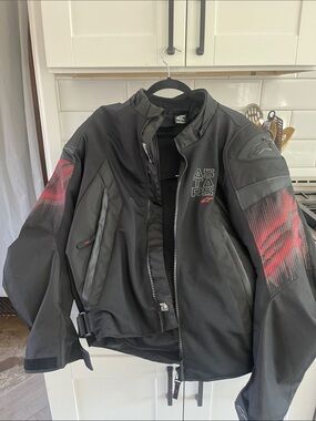 Alpinestars Black Jacket with Red Sleeve Accents